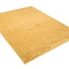 Alfombra Essence Shaggy Unicolor Mostaza