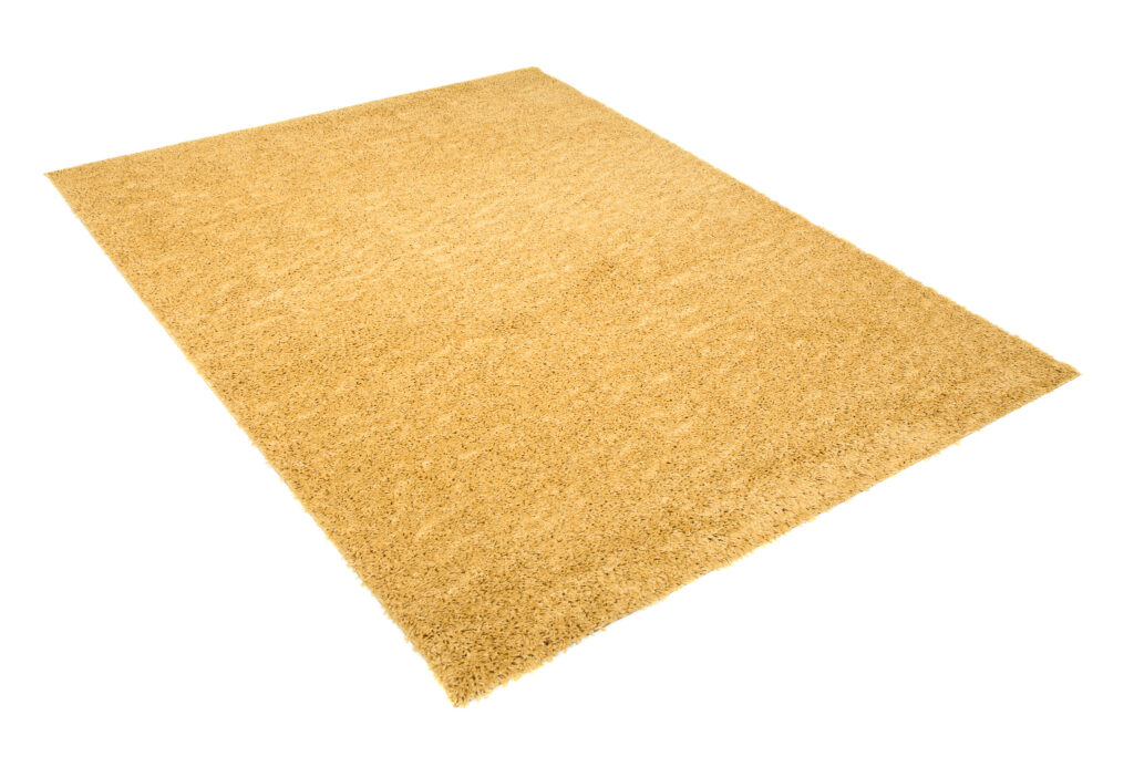 Alfombra Essence Shaggy Unicolor Mostaza