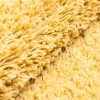 Alfombra Essence Shaggy Unicolor Mostaza